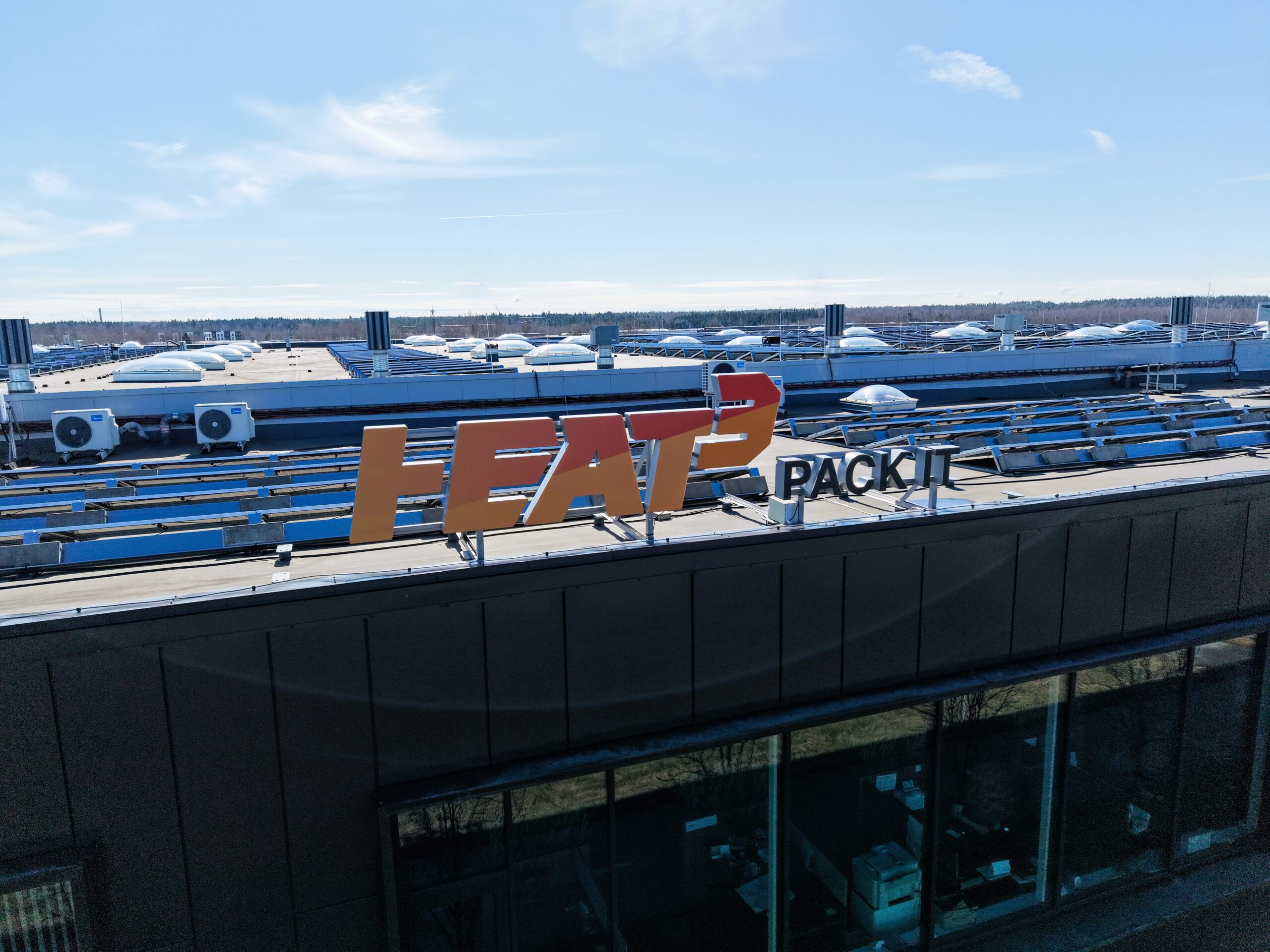 Shrink wrap solutions company heat3 logo on their office